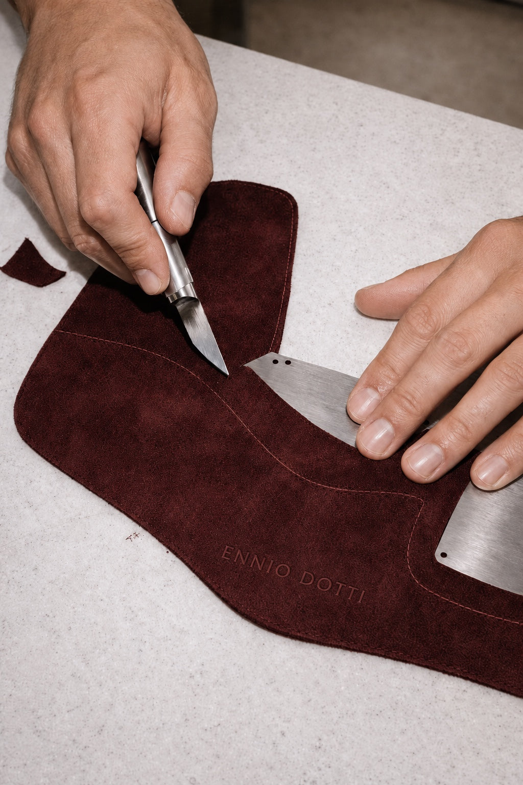 Ennio Dotti suede cut by hand in the atelier